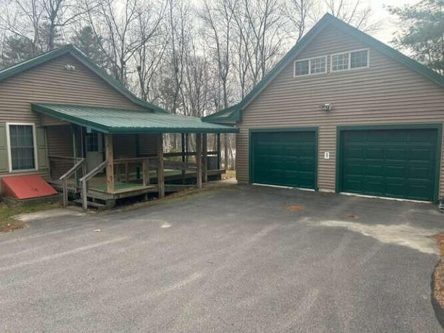 view of property exterior featuring a garage