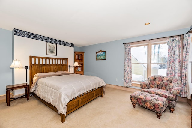 bedroom with light colored carpet