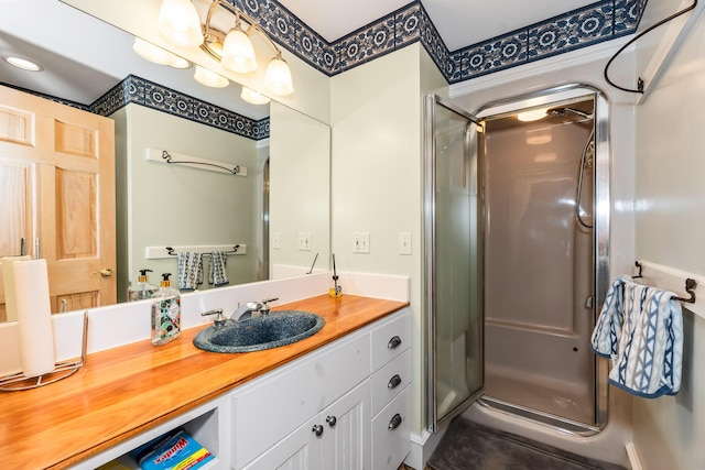 bathroom featuring vanity and walk in shower