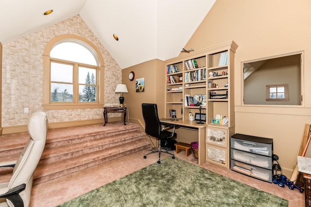 home office with carpet floors and vaulted ceiling