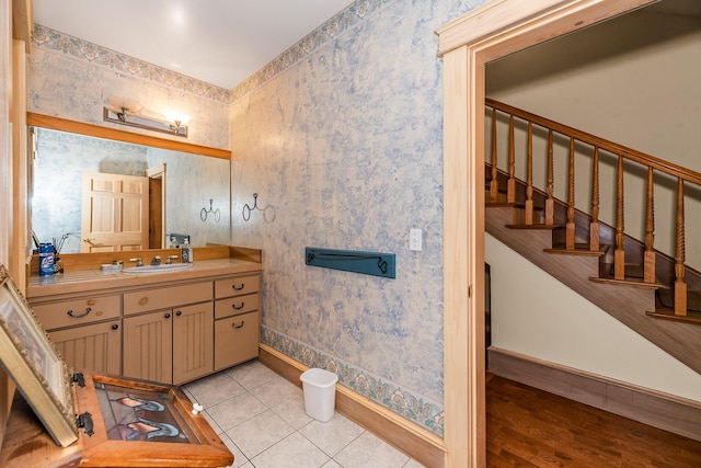 bathroom with vanity and wood-type flooring