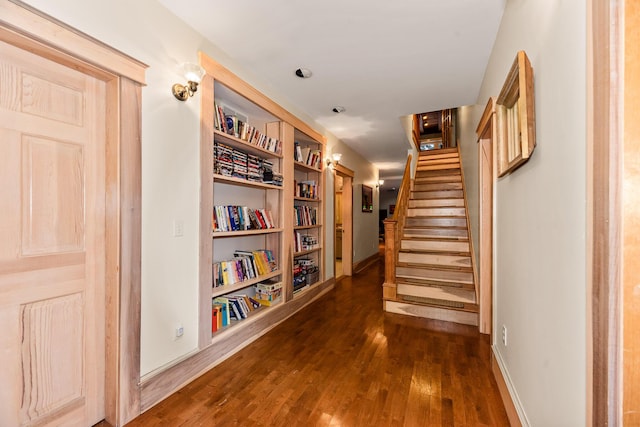 corridor featuring dark wood-type flooring