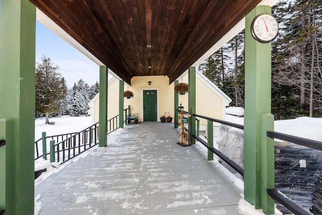 view of snow covered patio