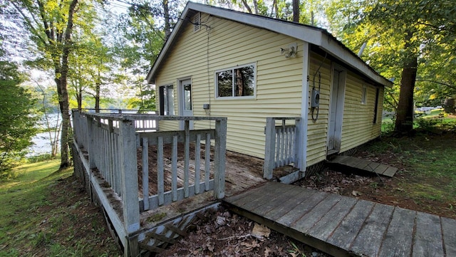 exterior space featuring a wooden deck