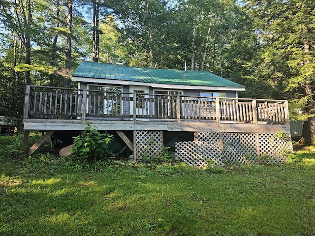 deck featuring a lawn