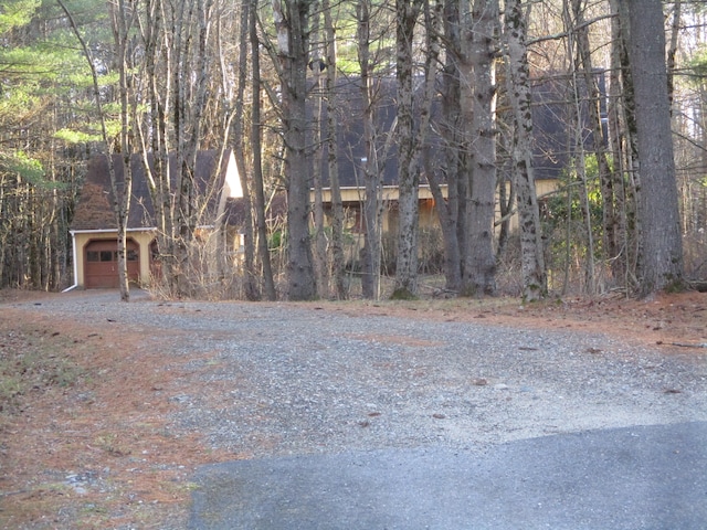 view of yard featuring a garage