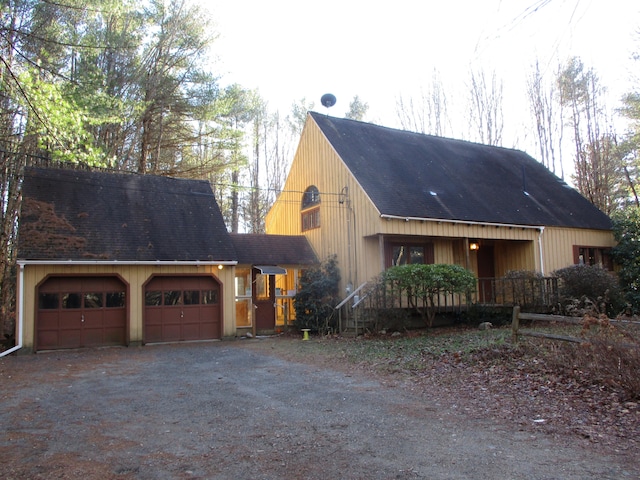 view of side of home with a garage