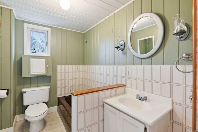 852 Gray Rd, Gorham, ME 04038 - full bath featuring vanity, a tub to relax in, and wood walls