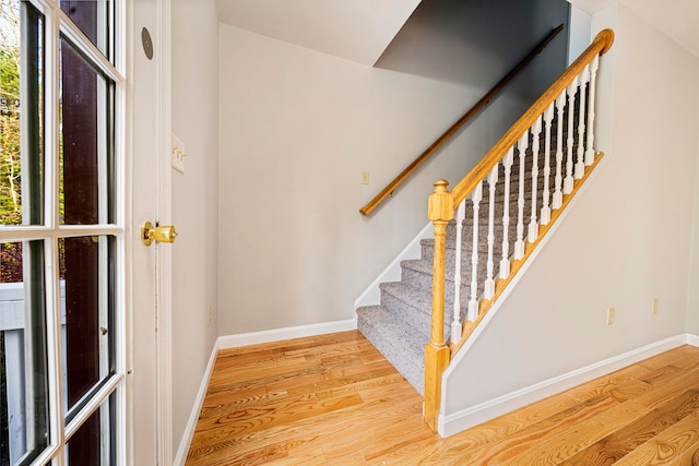 entrance foyer with light wood-type flooring and a wealth of natural light