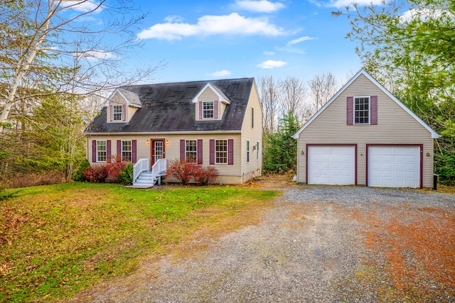 cape cod home featuring a front yard