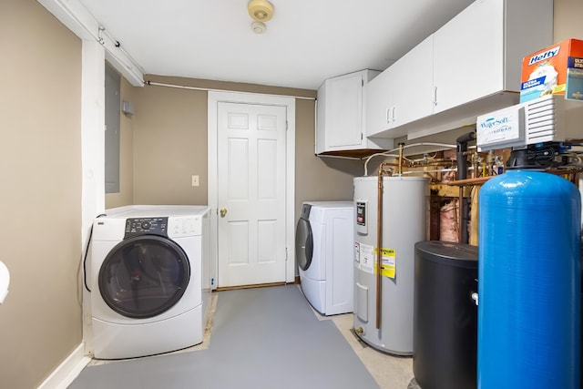 laundry room with electric water heater, cabinets, and independent washer and dryer