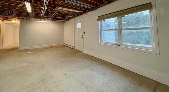 basement with baseboard heating