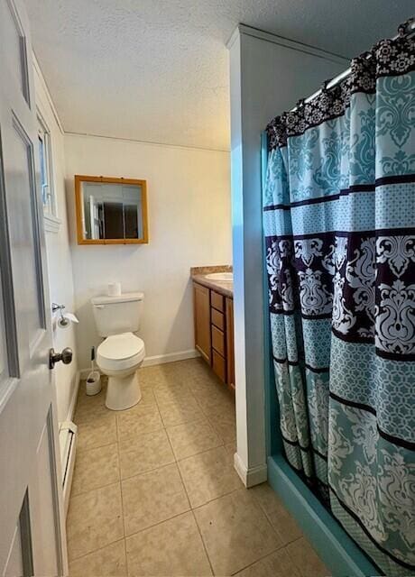 bathroom featuring baseboard heating, tile patterned flooring, vanity, a textured ceiling, and toilet