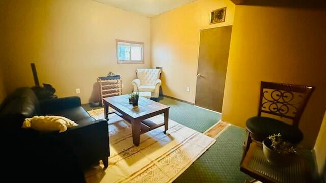 sitting room featuring carpet