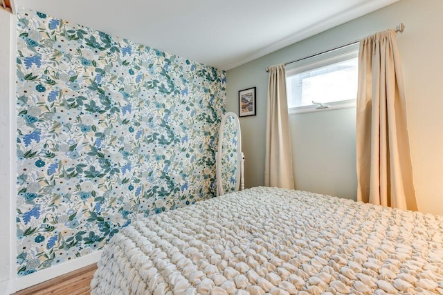 bedroom featuring wood-type flooring