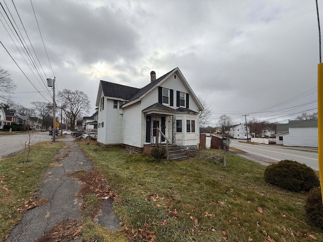 view of property exterior featuring a yard