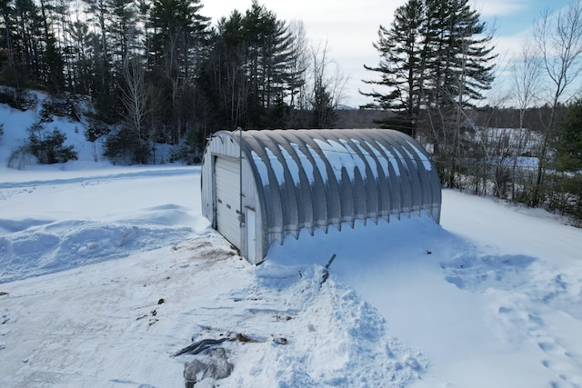 exterior space featuring an outbuilding