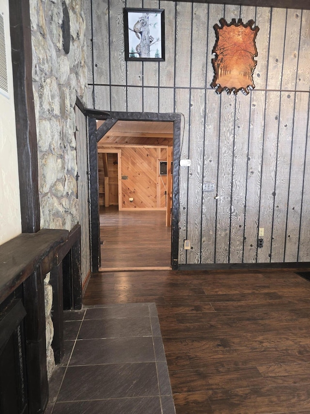 corridor featuring wood finished floors