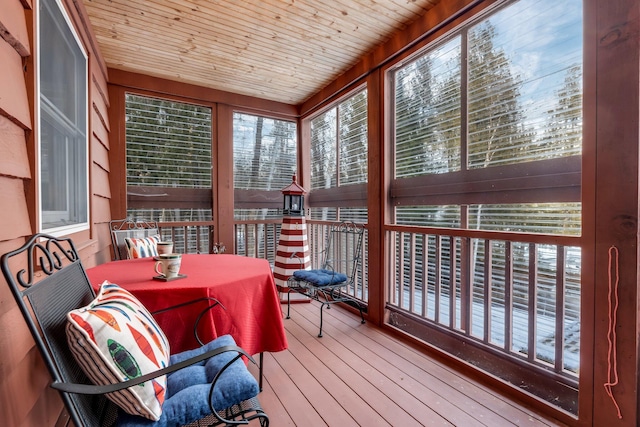 sunroom with wooden ceiling