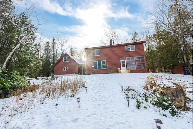 view of snow covered property