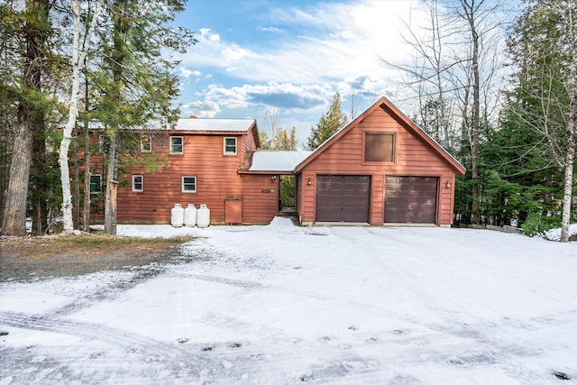 exterior space with a garage