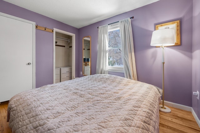 bedroom featuring wood-type flooring