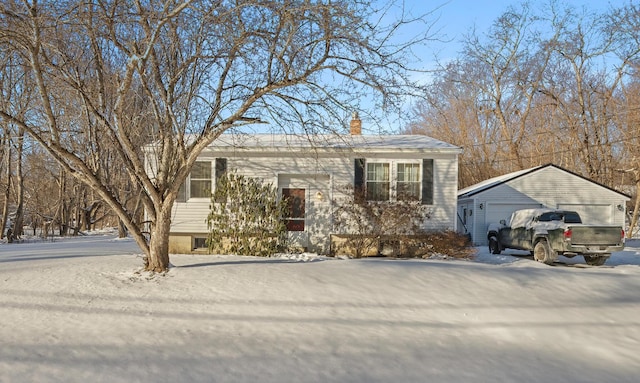 view of front of house featuring an outbuilding and a garage