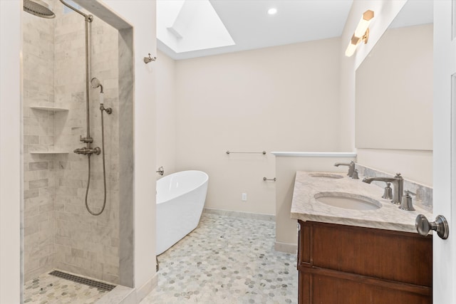 full bath featuring double vanity, a soaking tub, a sink, and a stall shower