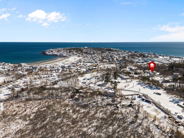 aerial view featuring a water view and a beach view