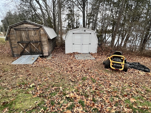 45 Douglas Dr, Newport, ME 04953 - view of shed featuring view of wooded area