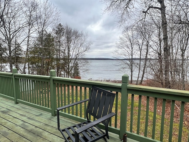 deck featuring a water view