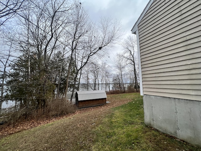 45 Douglas Dr, Newport, ME 04953 - view of green lawn featuring a storage unit