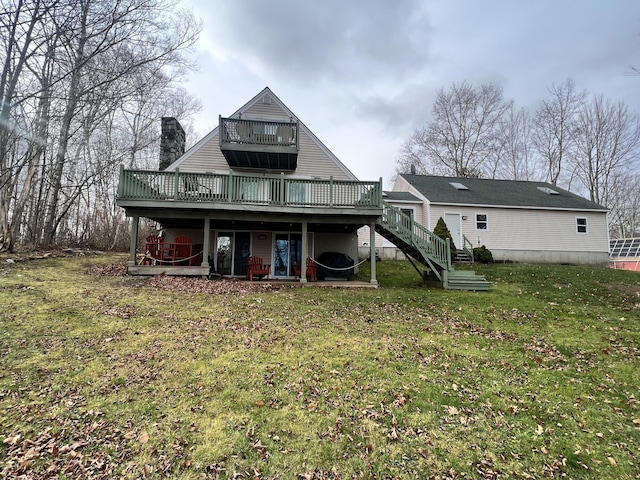 45 Douglas Dr, Newport, ME 04953 - rear view of house with stairway, a deck, a chimney, and a yard