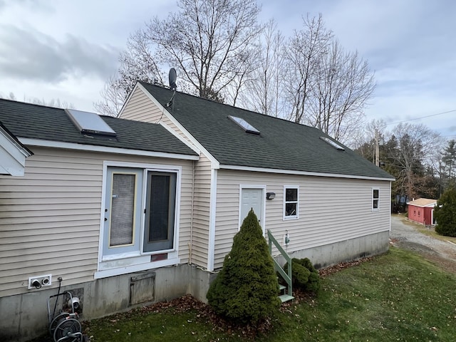45 Douglas Dr, Newport, ME 04953 - back of house featuring roof with shingles