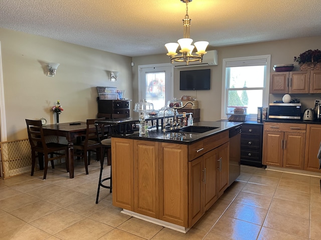 45 Douglas Dr, Newport, ME 04953 - kitchen with appliances with stainless steel finishes, dark countertops, a chandelier, light tile patterned flooring, and a textured ceiling