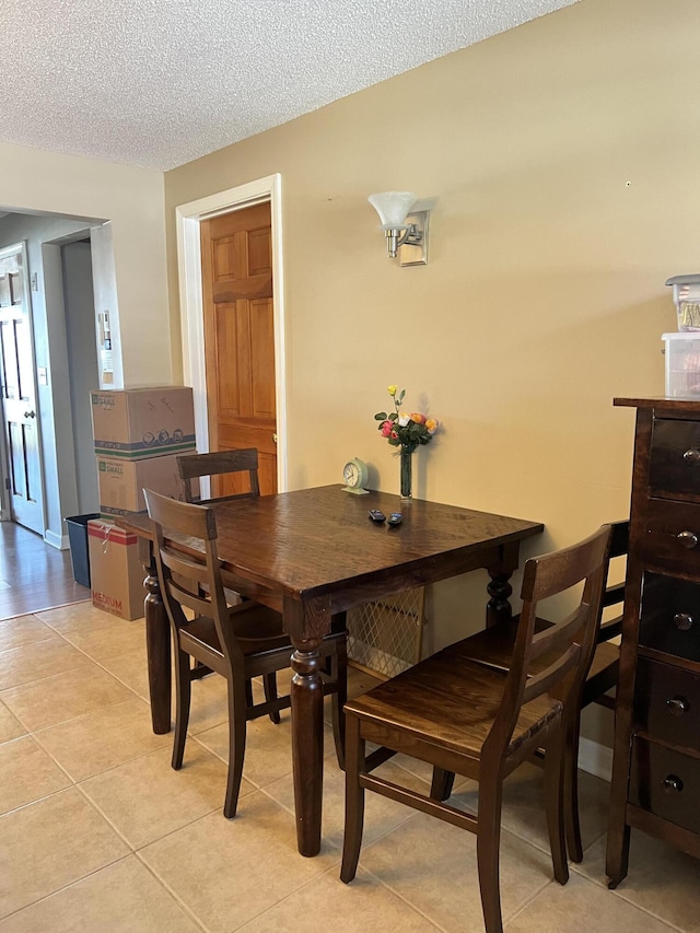 45 Douglas Dr, Newport, ME 04953 - dining area featuring light tile patterned floors and a textured ceiling