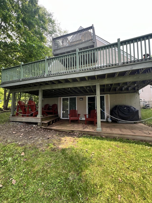 45 Douglas Dr, Newport, ME 04953 - back of house featuring a deck and a lawn