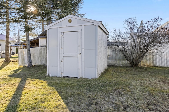 view of outdoor structure featuring a yard