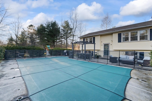 view of swimming pool featuring a pergola and a patio