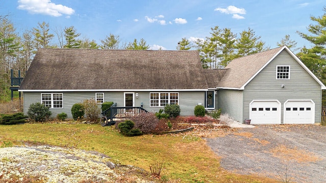 cape cod-style house with a front lawn