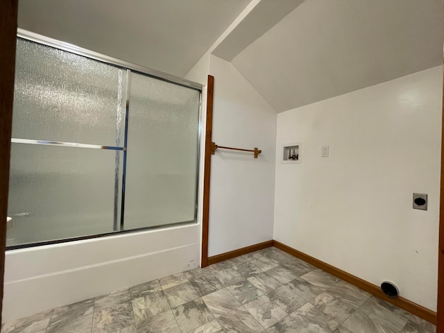 bathroom with bath / shower combo with glass door and vaulted ceiling