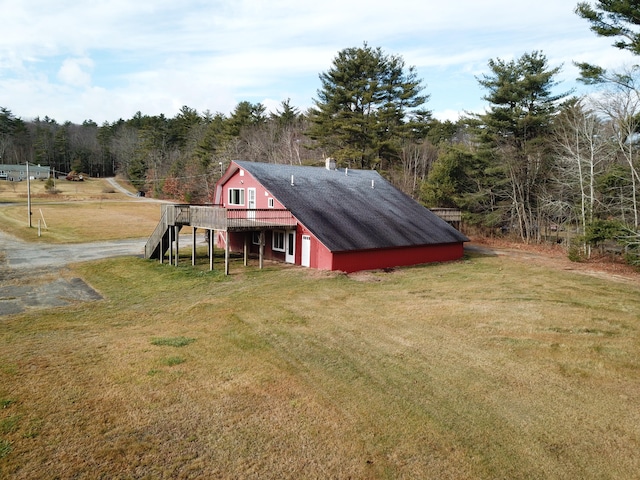 view of outdoor structure with a yard