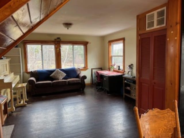 20 Monument Rd, Abbot, ME 04406 - living room with dark wood finished floors
