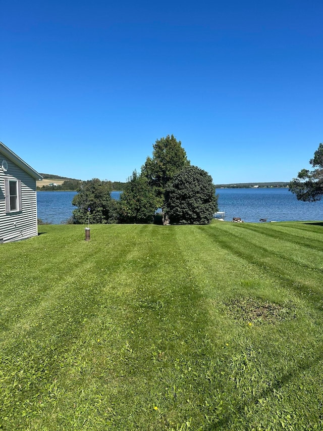 view of yard with a water view