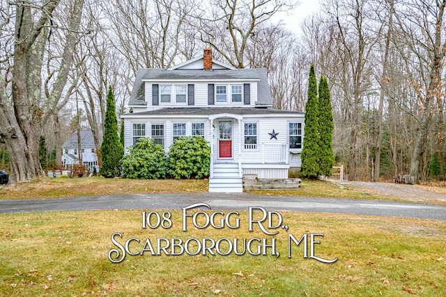 view of front of home with a front yard