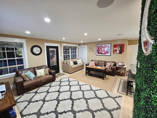 living room with light hardwood / wood-style floors