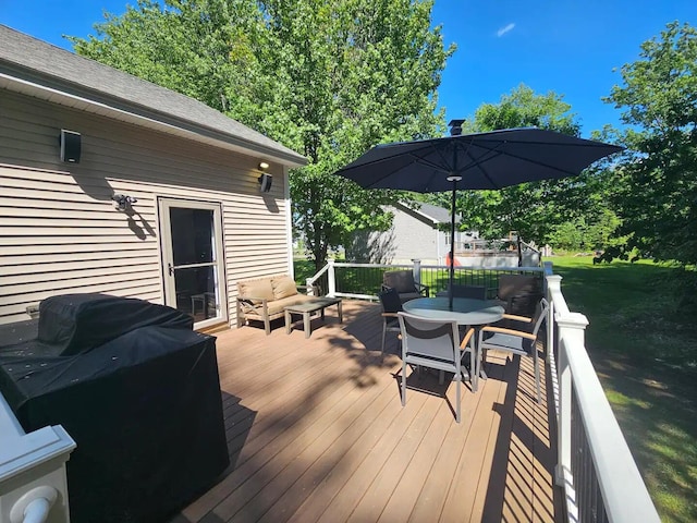 wooden deck featuring grilling area