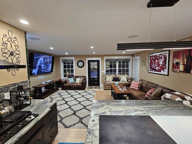 living room with light hardwood / wood-style floors