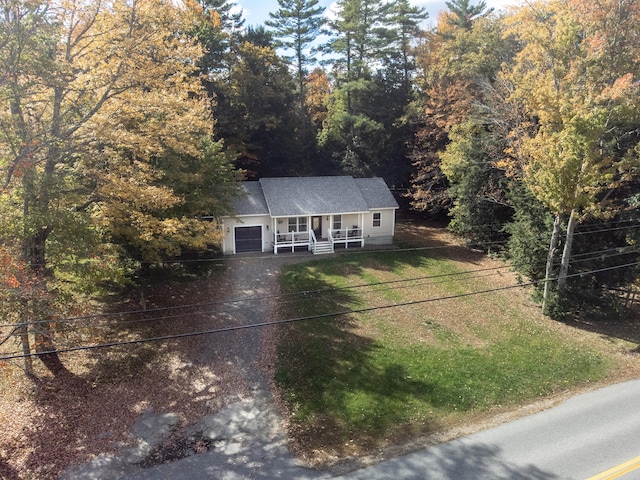 view of front of house featuring a garage and covered porch