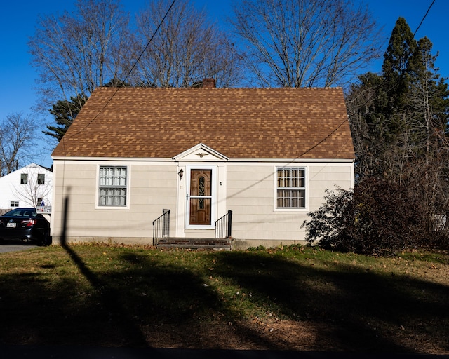 view of front facade with a front lawn